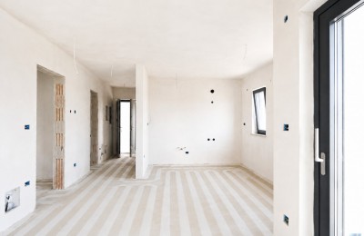Apartment on the first floor of a modern building - under construction