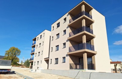 Ground floor apartment with garden in a new building, close to the center of Porec
