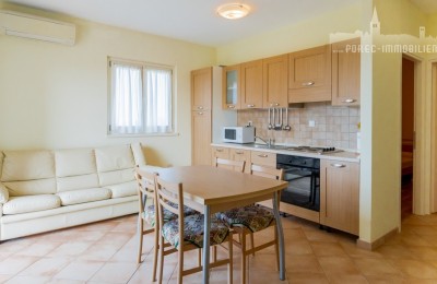 Apartment on the first floor, with a swimming pool and tennis court, 6 km from the center of Poreč