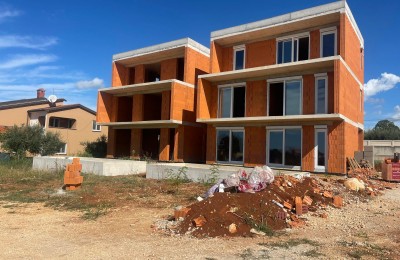 Semi-detached house with a swimming pool in the shell stage, with a beautiful view of the sea